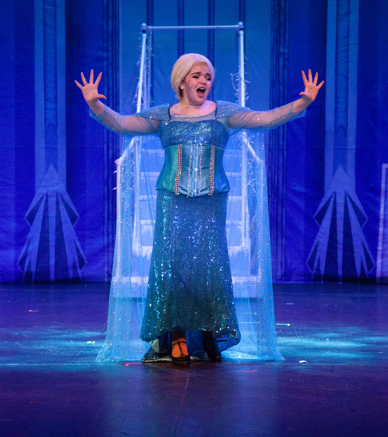 Elsa in front of staircase
